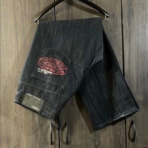 Rocawear men's dark wash denim jeans, size 42.